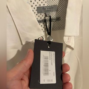 Ted Baker button down men’s shirt. White with pink detail. Size 4. Medium fit.